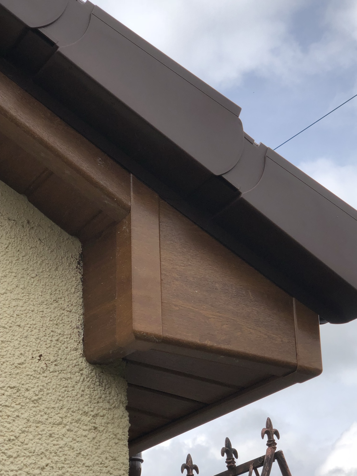 After: light oak box end soffit and new guttering